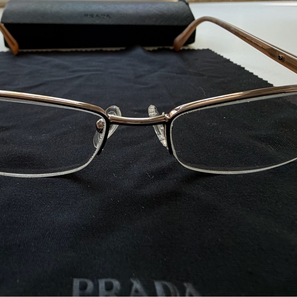 Prada Rimless Rectangle Glasses With Gold-Tone Temples And Black Case View 4